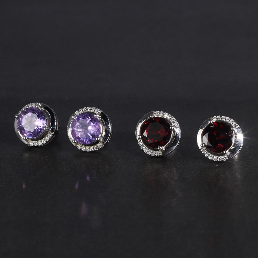 أحدث تصاميم الأقراط المزينة بالأحجار الكريمة