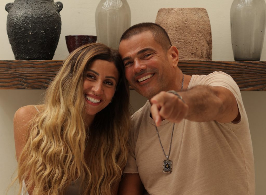 أنباء عن محاولات صلح عمرو دياب ودينا الشربيني!