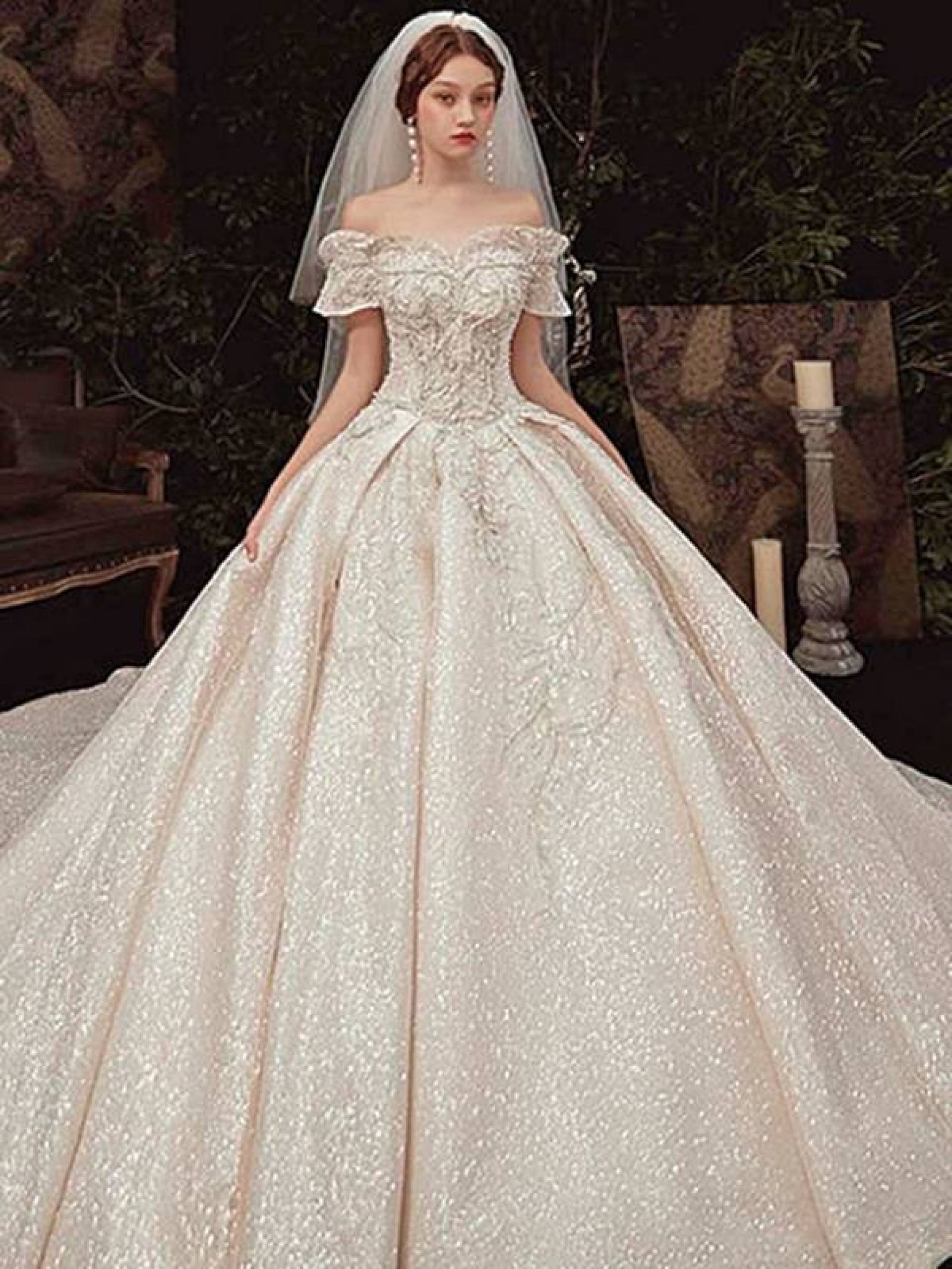  شكل فستان الزفاف